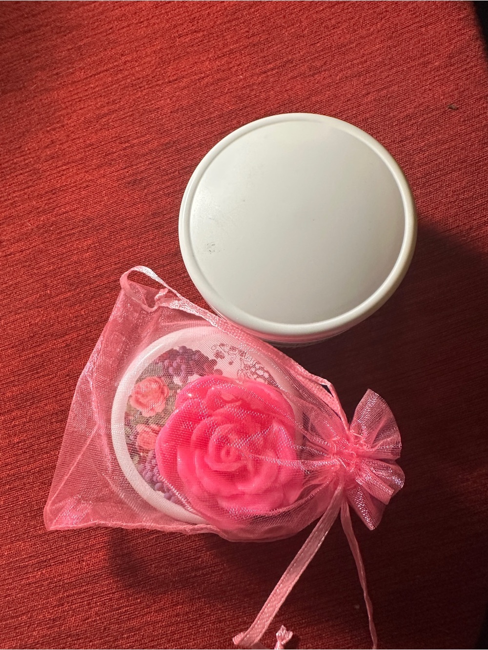 Two hydrating face creams with scented rose accessory